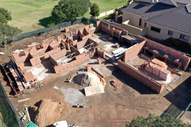 With the foundation cured, the brickwork commences and the house starts to take shape